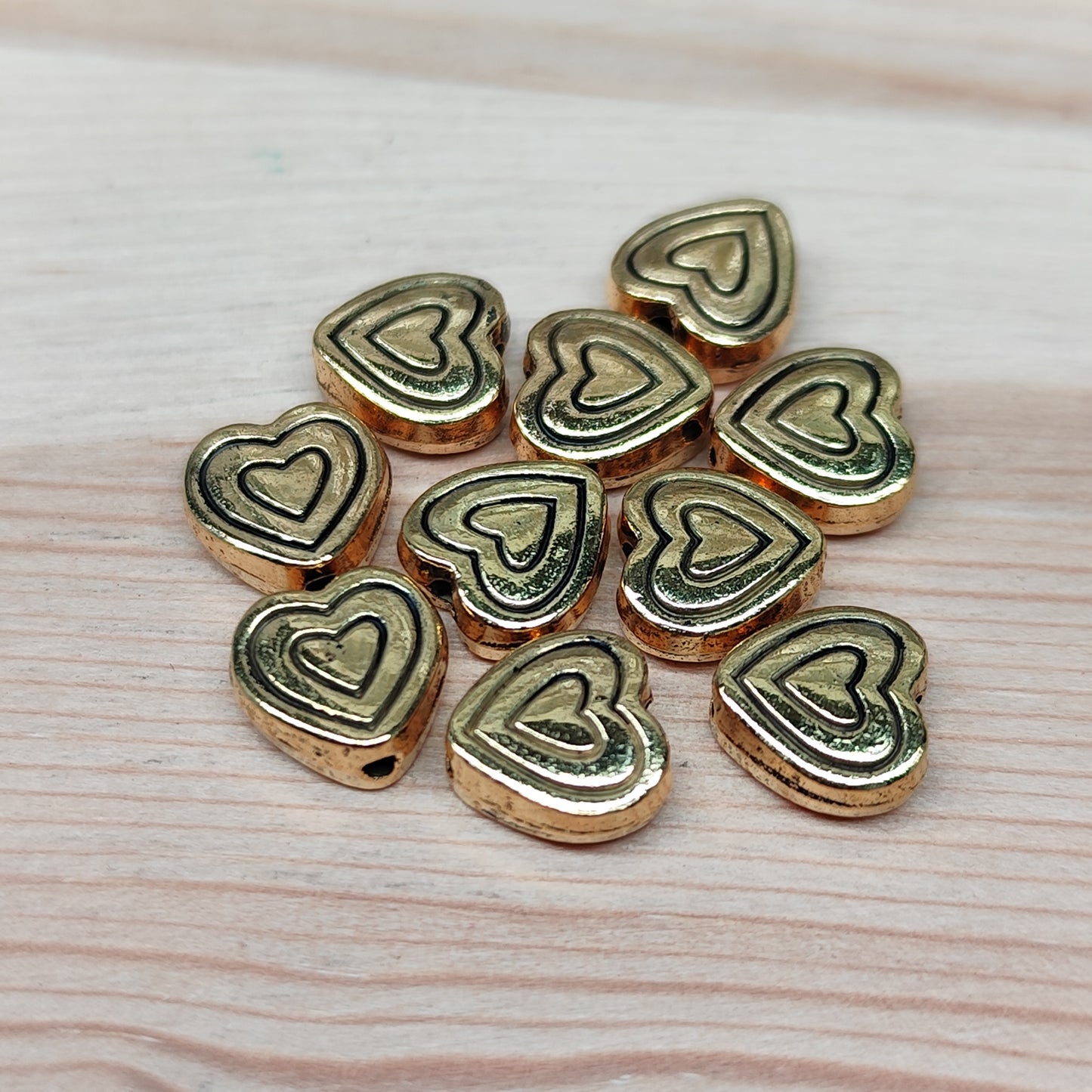 Perles coeur en métal doré – 8,5 mm - lot de 10