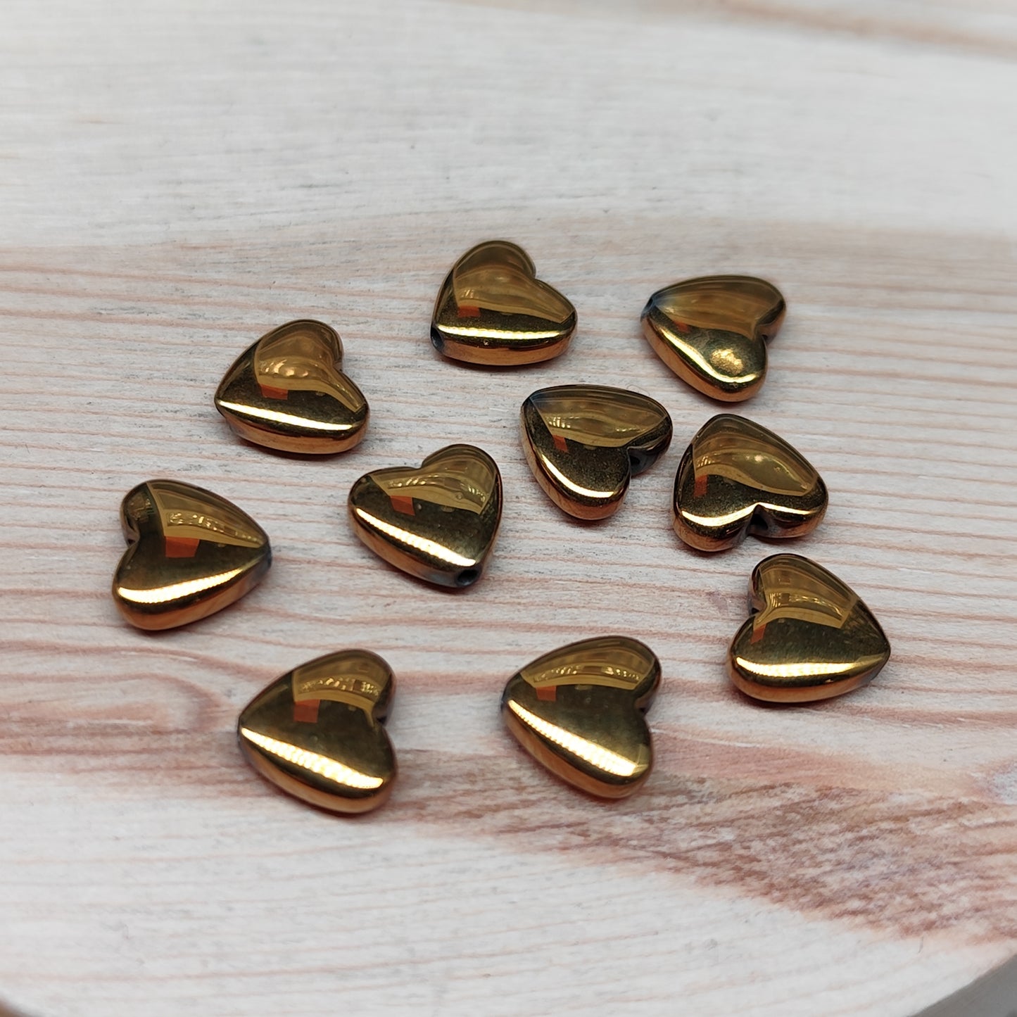 Hématite coeur doré – 8 mm – lot de 10