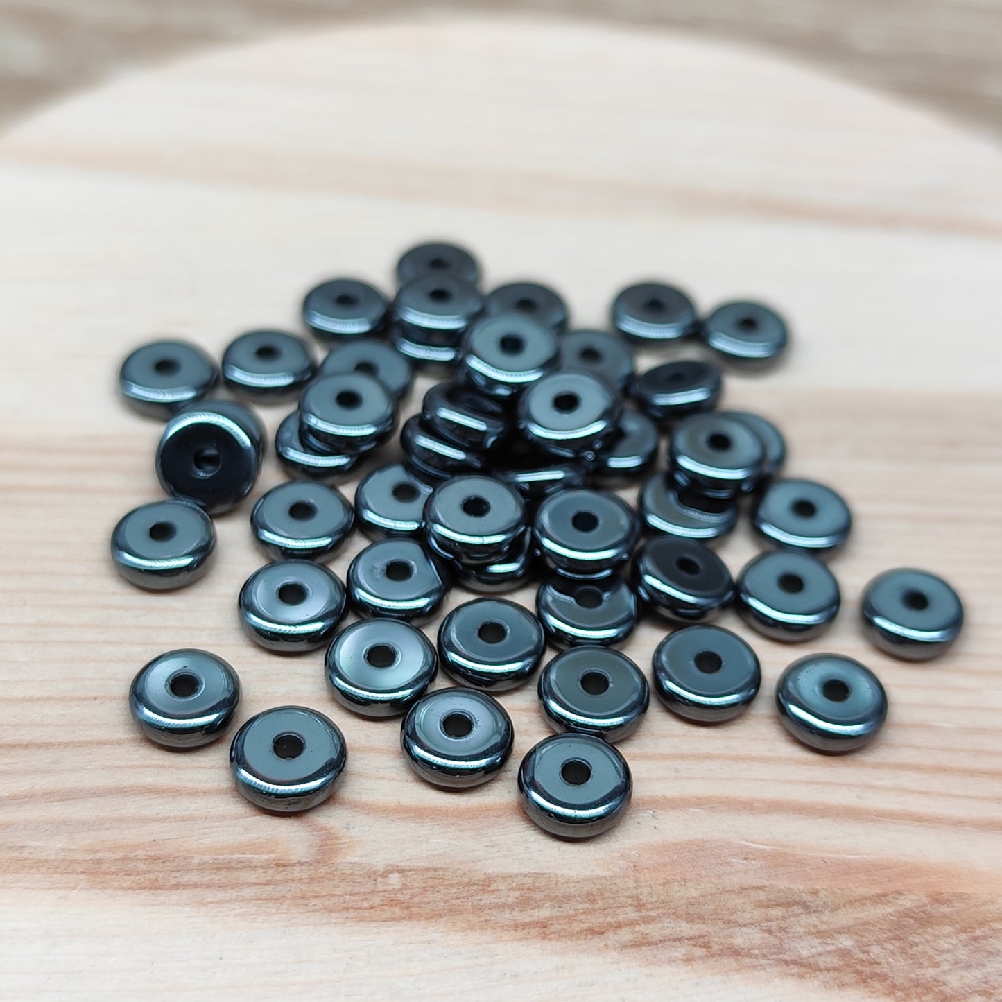 Hématite perle plate d'espacement – 5,5 mm – lot de 50