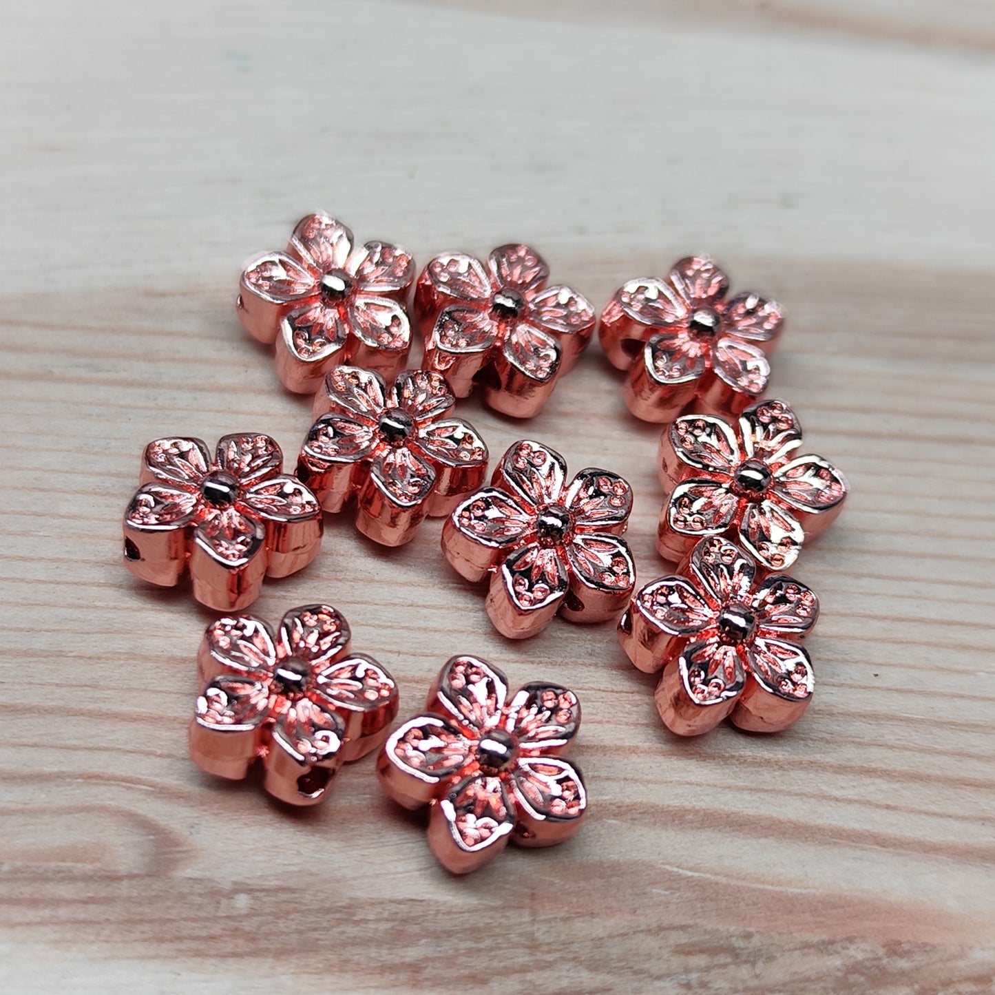 Perle fleur en métal or rose – 8,5 mm - lot de 10