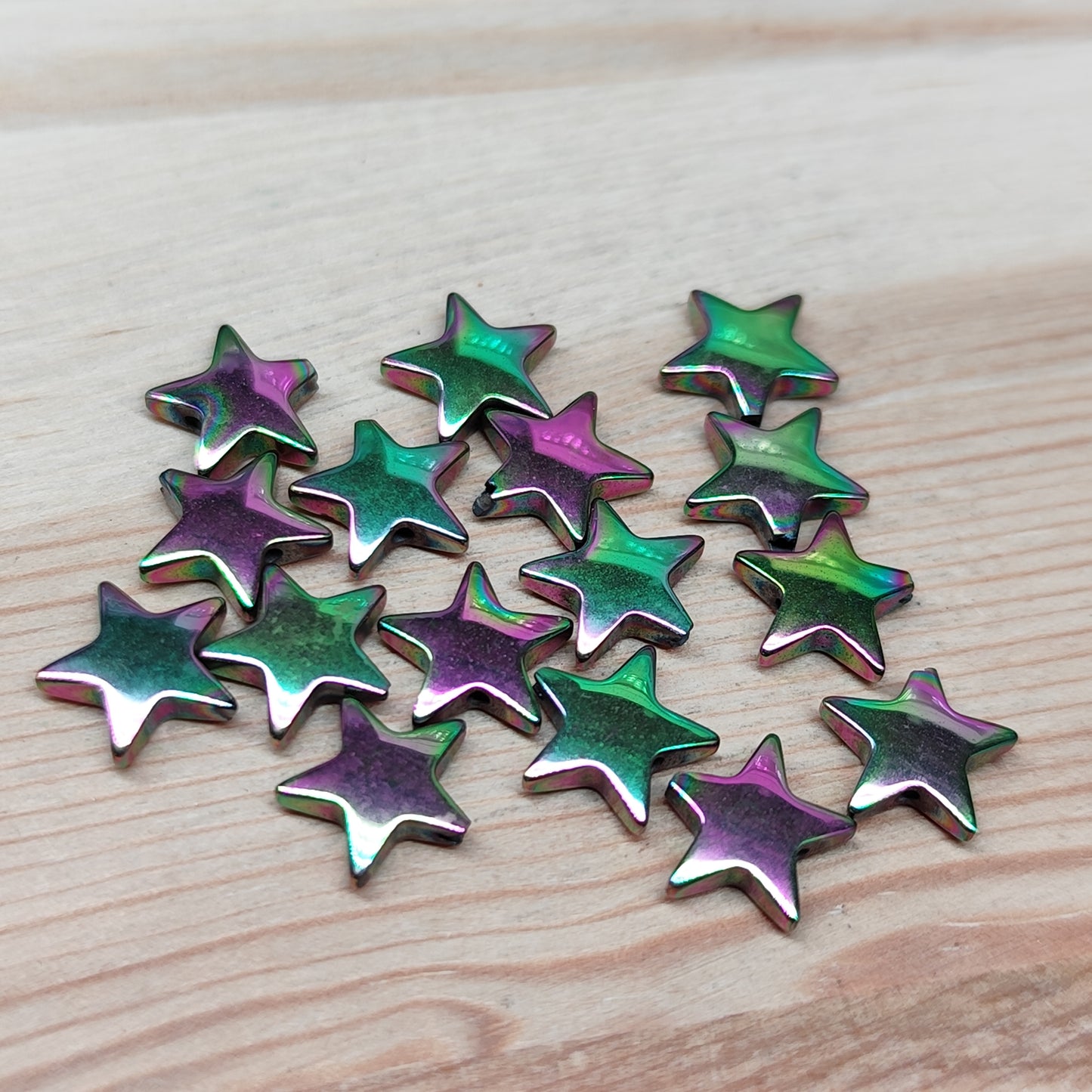 Hématite étoile rose vert – 8,5 mm – lot de 15