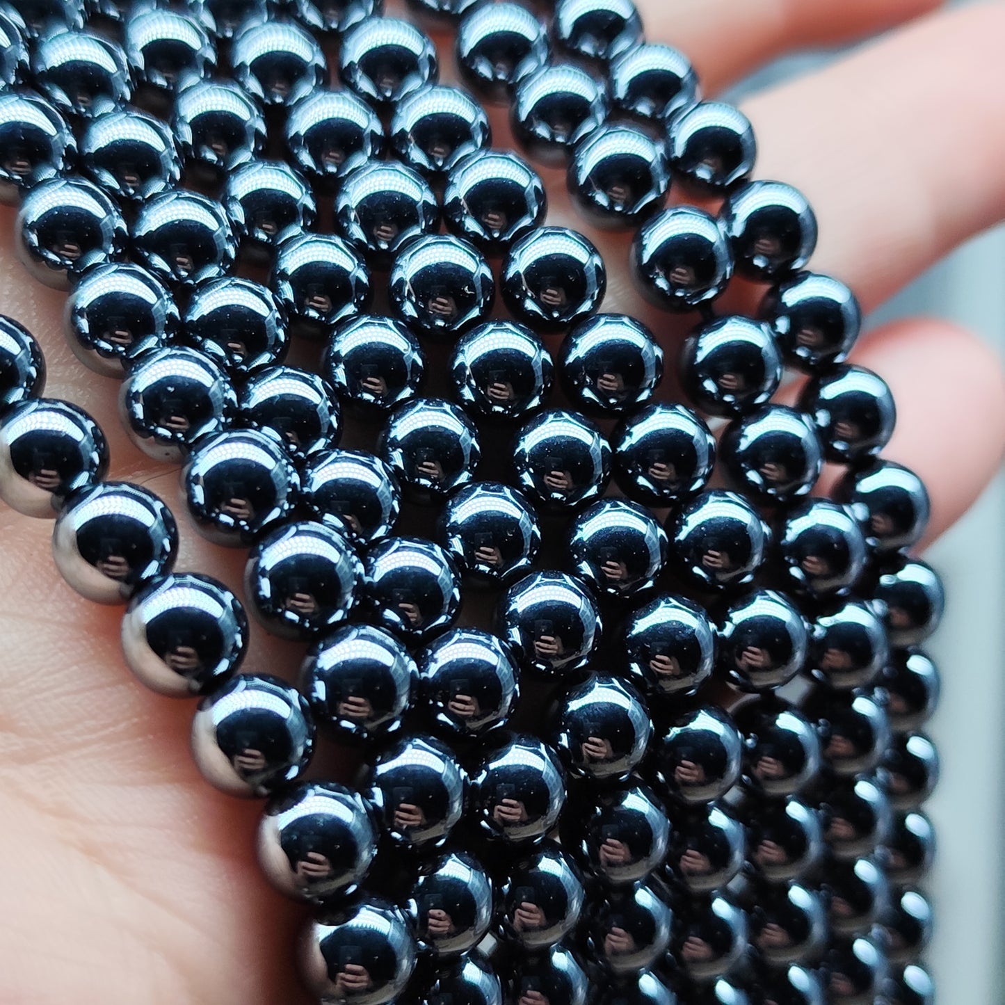 Térahertz – perles synthétiques 6,5 mm – 1 fil entier